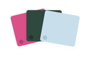 Three colorful SteelSeries mousepads.